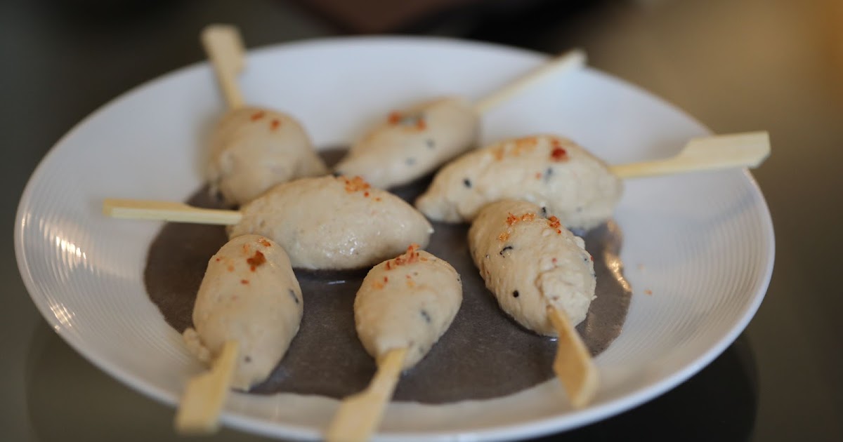 Quenelles de volaille sauce aux truffes 