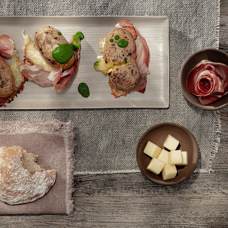 Pommes de terre farcies au Speck Alto Adige IGP et au Fromage Stelvio AOP