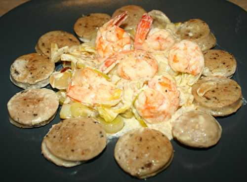 Boudin blanc truffé et gambas sur fondue de poireau à la crème