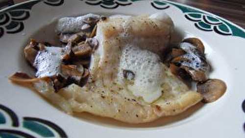 Filet de lieu jaune a la crème d' ail et champignons