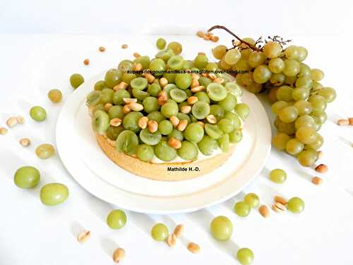 Tarte cacahuètes et raisin d'après Ludovic Fontalirant : pâte sucrée, crème cuite aux cacahuètes, praliné aux cacahuètes, crème pâtissière à la vanille, raisins