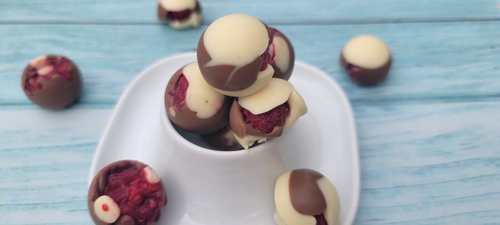 Balls chocolat blanc/praliné/framboise