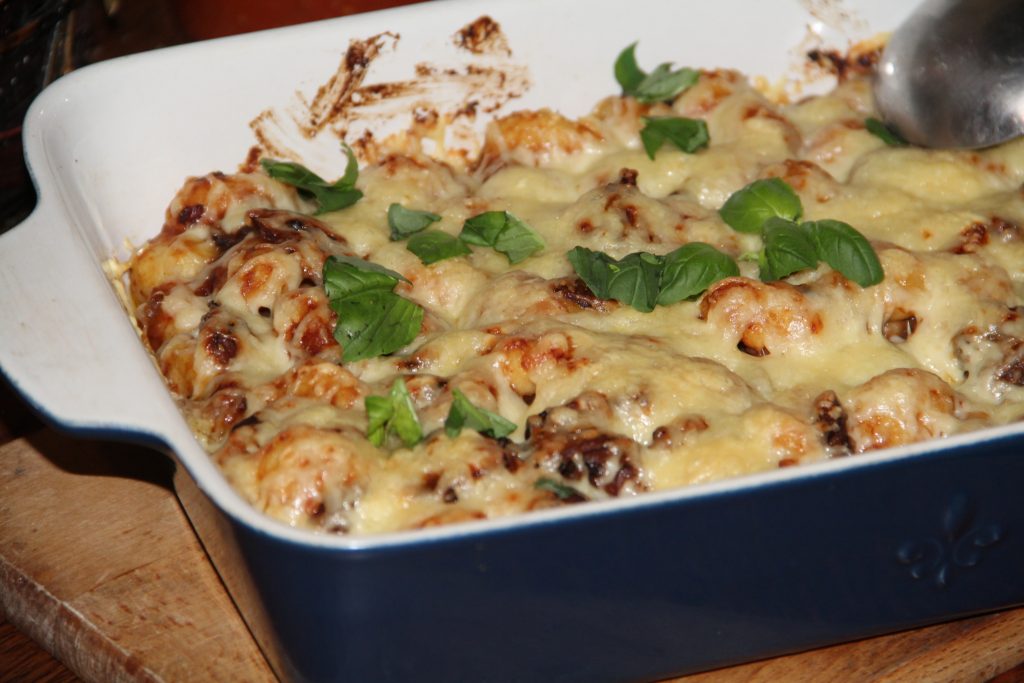 Gratin de gnocchis frais, champignons de paris et coulis de tomates