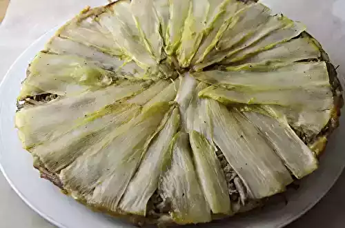 Tatin d'endives au canard confit et jus de clémentine