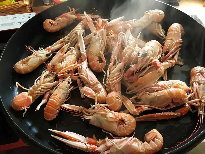 Cuisson des langoustines à la poêle