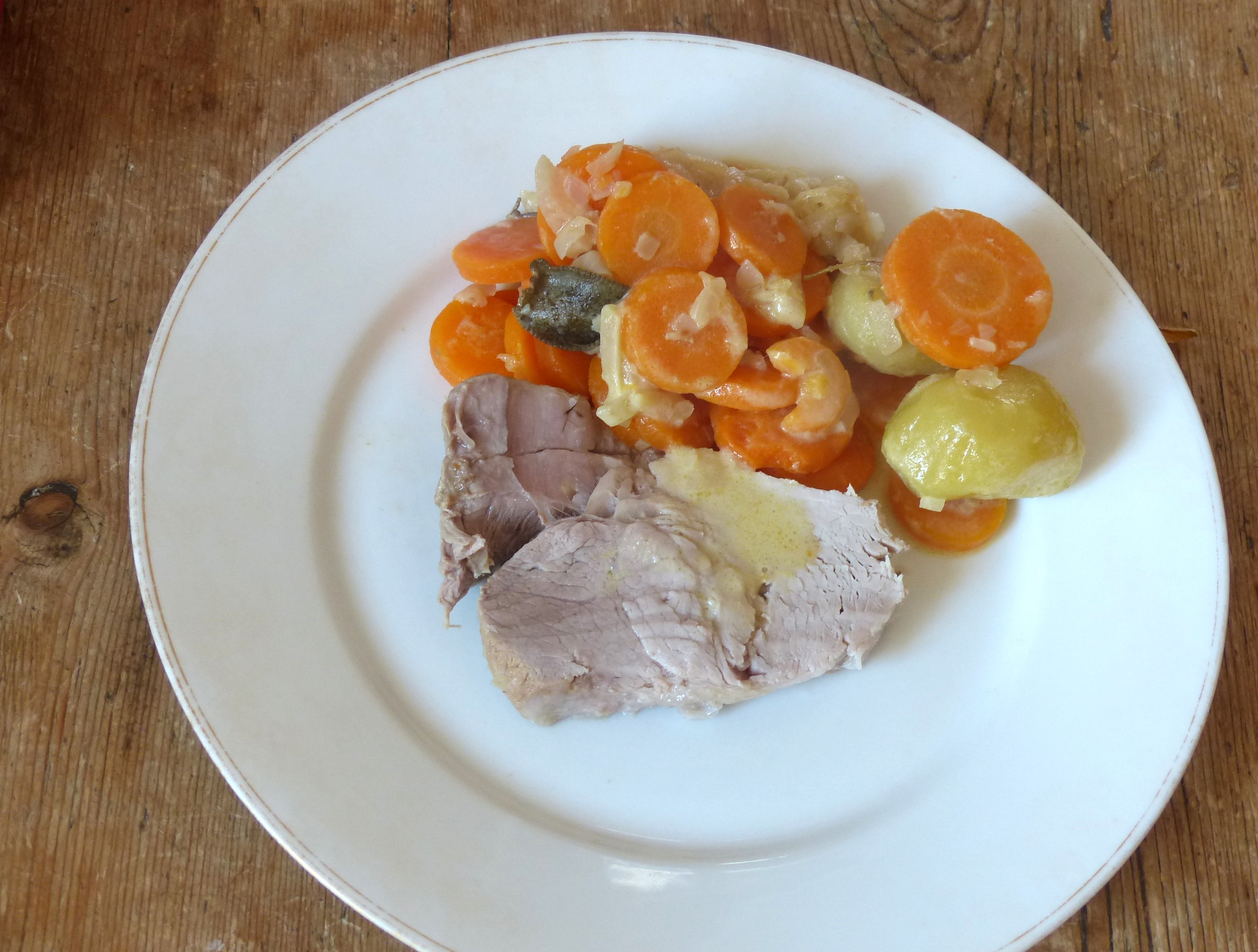 Rôti de porc aux oignons et carottes