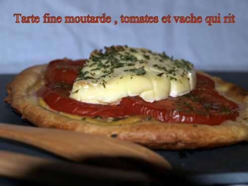 Tarte fine moutarde , tomates et vache qui rit