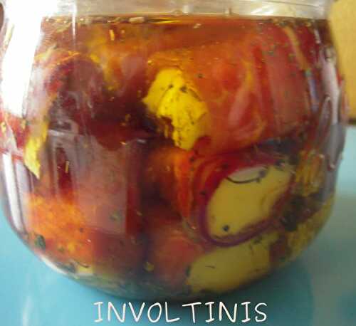 INVOLTINIS (petits roulés de mozzarella au jambon de Parme, marinés à l'huile d'olive)