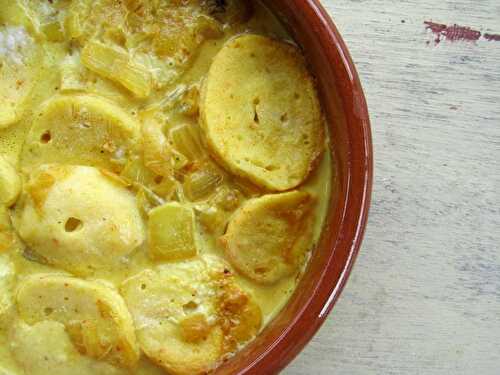 Cassolette de quenelles lyonnaises au curry, crevettes et lait de coco