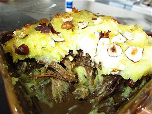 Parmentier de canard confit aux noisettes