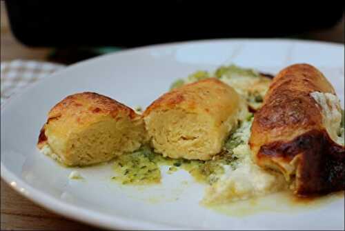 Gratin de quenelles de brochet sur lit de courgettes et crème de parmesan