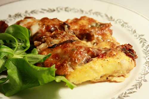 Gratin de quenelles, sauce aux aubergines & mozzarella