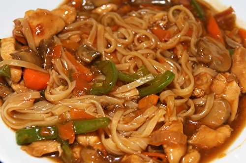Vegetables and chicken stir fry with rice noodles