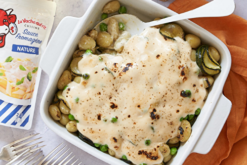 Gratin de gnocchi aux petits pois, courgettes, oignons nouveaux à la sauce fromagère nature La Vache qui rit