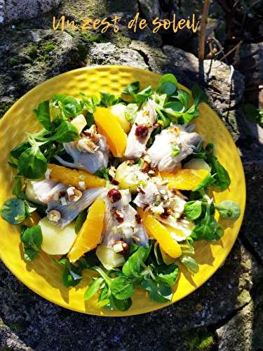 Salade tiède de raie à l'orange et noisettes grillées