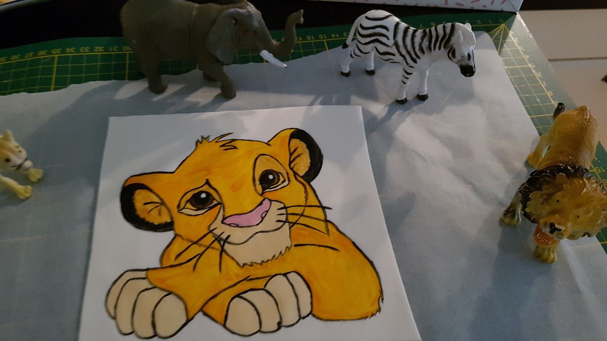 Peinture sur pâte a sucre "Le roi lion"