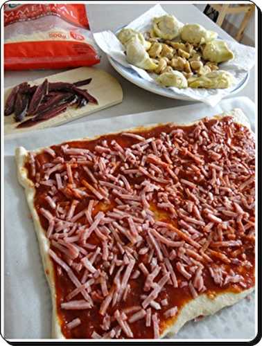 Pizza au magret de canard séché et fonds d'artichauts