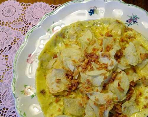 Omelette aux chips de pommes de terre et oignons séchés par Eric Frechon