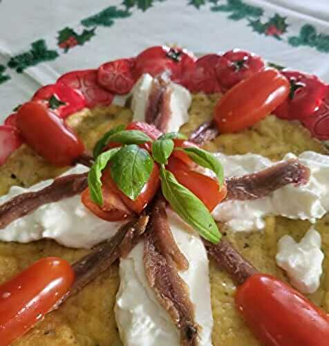 Omelette avec burrata, anchois et tomates