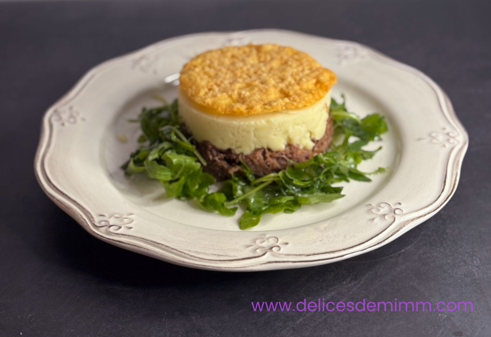 Parmentier de canard confit, roquette et tuile de parmesan( astuce)