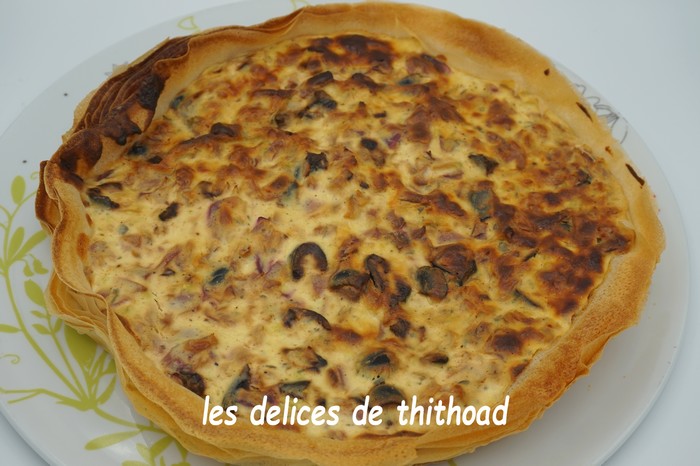 Tarte aux oignons, boursin et olives