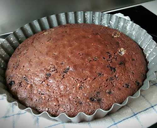 Moelleux au chocolat noir éclats d'amandes aux myrtilles sauvages .