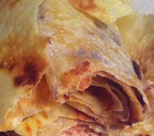 Roulades de crêpes façon dentelles  à la pâte à tartiner équitable Alter Eco .