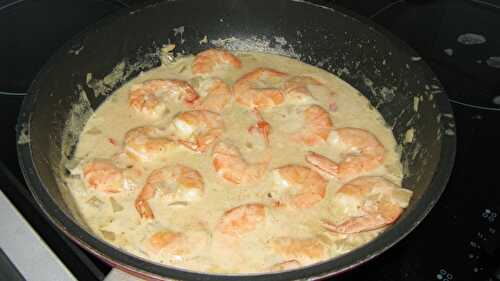 Crevettes roses flambées au lait de coco et frites de patates douces