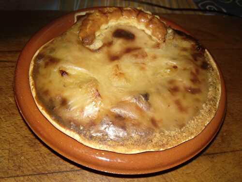 Coquille de saint jacques et de lotte aux champignons gratinée