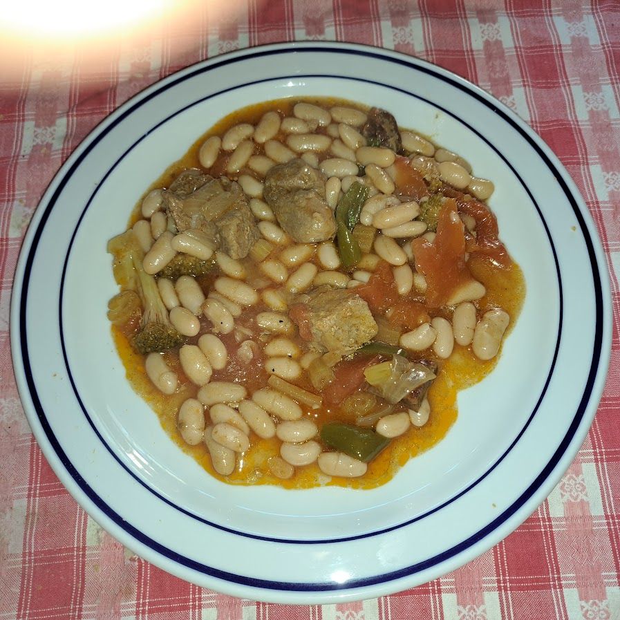 Ragoût de porc aux haricots et à la tomate au garam massala