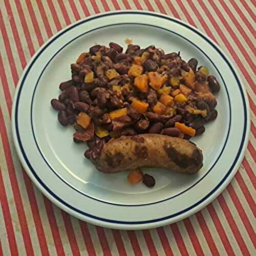 Mijotée de saucisses aux herbes aux haricots rouges et potimarron au poivron jaune épicés