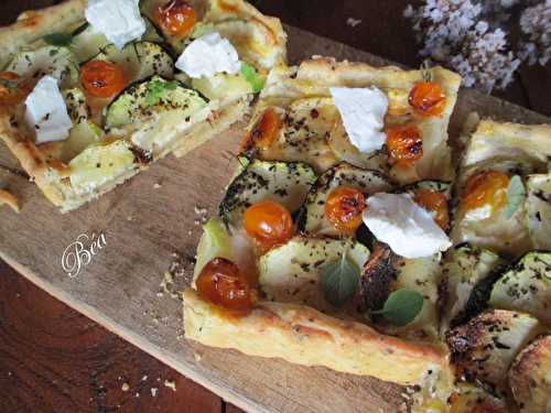 Tarte aux courgettes, tomates  confites et chèvre frais