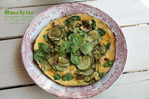 Omelette aux courgettes braisées à l'ail et pousses d'épinard