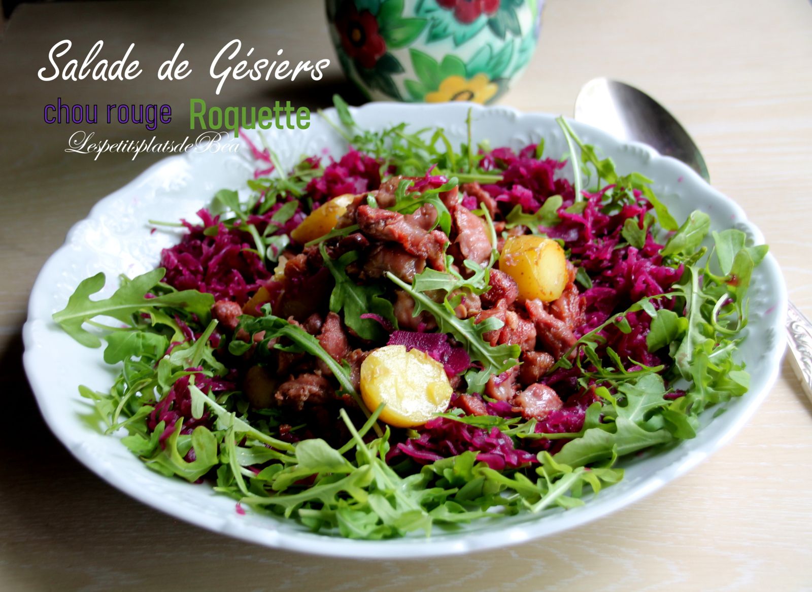 Salade de gésiers confits, chou rouge et  roquette