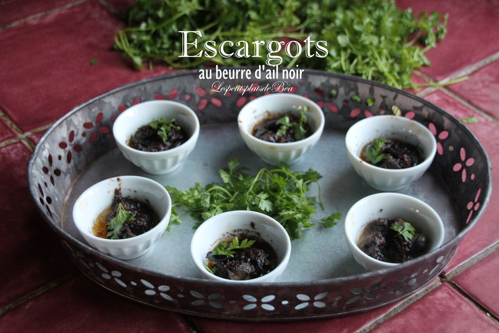 Escargots au beurre d'ail noir