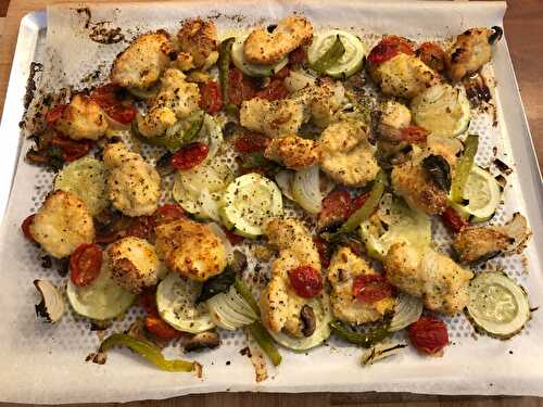 Panés de poulet au parmesan avec ses légumes au four