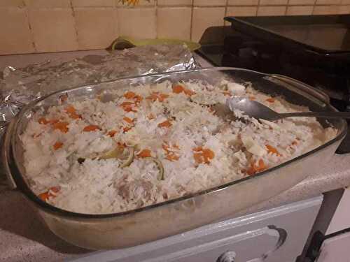 Poisson au four et mélange riz pilaf et carotte