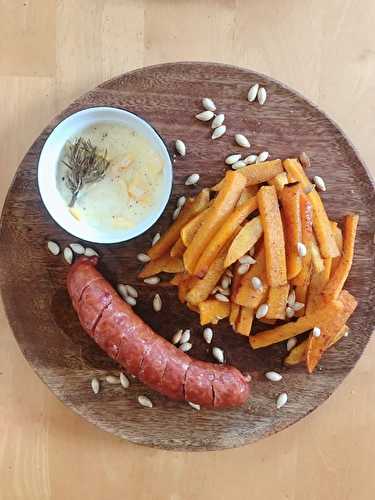 Frites de butternut et graines de courge grillées. Sauce reblochon et saucisses de Montbéliard