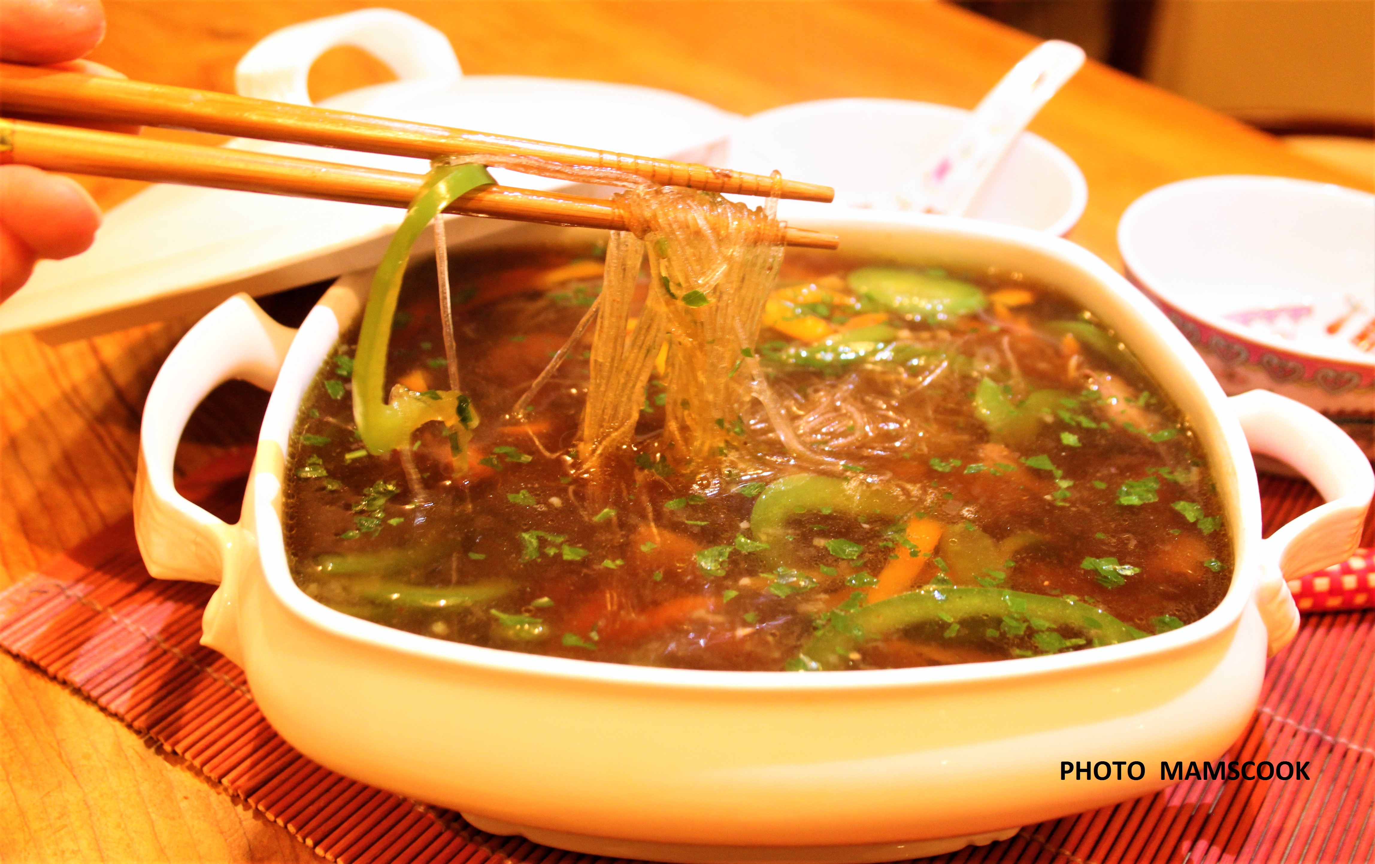 Bouillon épicé aux aiguillettes de canard