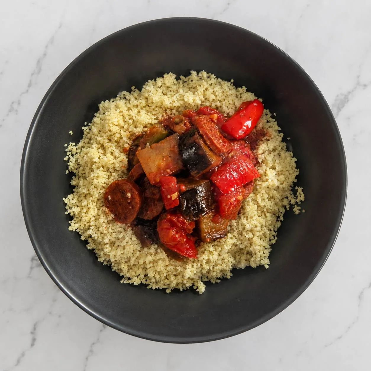 Recette d’aubergines à la poêle au chorizo et tomates