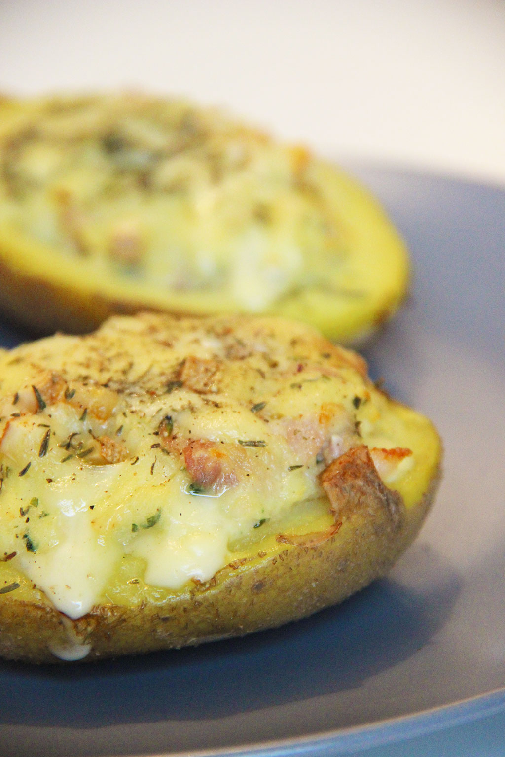 Pommes de terre farcies au raclette et bacon