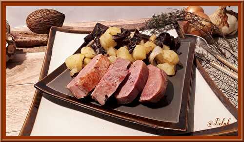 Magrets de canard aux pommes de terre et champignons noirs