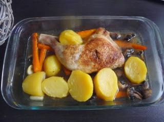 Cuisses de poulet et légumes au four