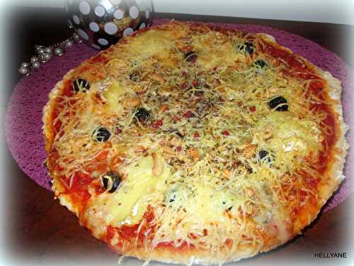 Pizza à la tomate, et aux 4 fromages, fruits secs "sans gluten"