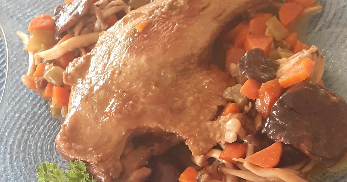 Cuisses de canard aux champignons des bois  et carottes 