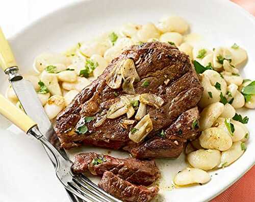 Steak à l’ail et aux haricots blancs sautées