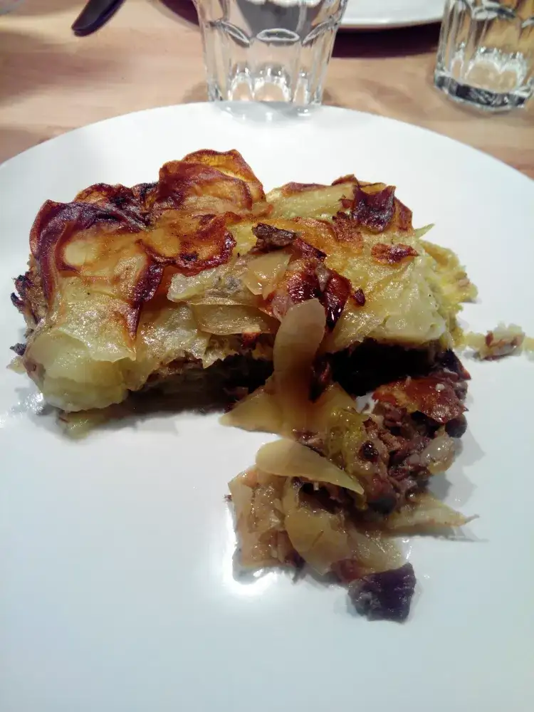 Confit de canard au chou et deux pommes