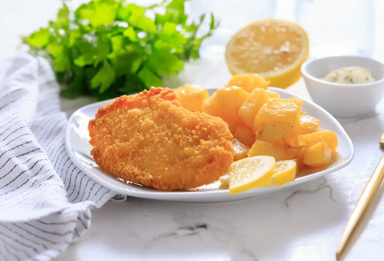 Escalopes de poulet panées au four