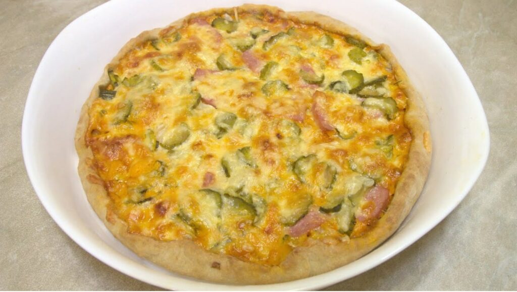 Recette de Tarte salée aux courgettes et lardons