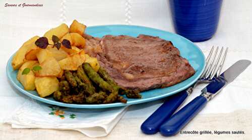 Entrecôte grillée et légumes sautés.